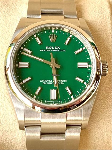 silver rolex with green face|rolex oyster perpetual green face.